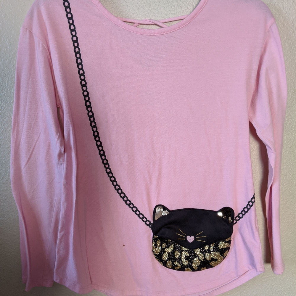 Pink 3/4 sleeve top with little purse attached